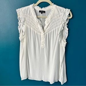 1.State top with smocking and ruffles.